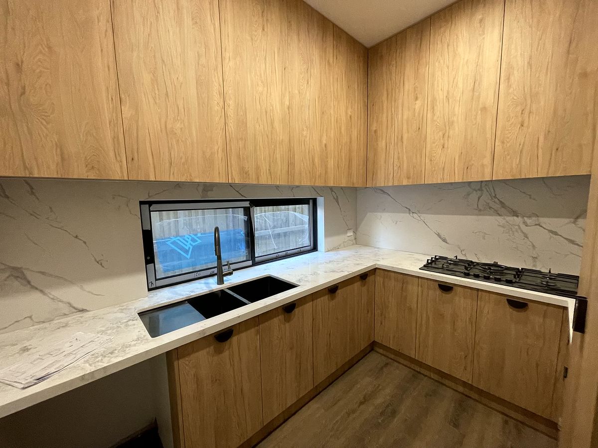 Timber and marble kitchen joinery